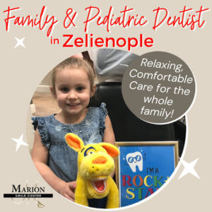 family and pediatric dentist in Zelienople banner with a little girl smiling holding a yellow stuffed toy
